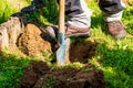 Man digging hole with shovel Royalty Free Stock Photo