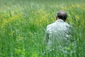 Man on green field Royalty Free Stock Photo