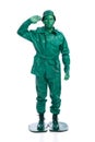 Man on a green toy soldier costume Royalty Free Stock Photo