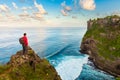 Man greeting nature on the top of mountain Royalty Free Stock Photo