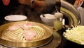 Man grilled food with cooker hood