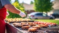 Man grilling meat and vegetables outdoors
