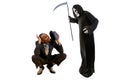 Man in Grim Reaper Ghost Costume Playing a Prank on Halloween