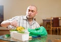 Man grow parsley and dill Royalty Free Stock Photo