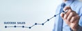 Man with growth graph. Success sales Royalty Free Stock Photo
