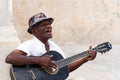 Man with a guitar in Havana Royalty Free Stock Photo