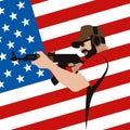 Man with gun on the background of the American flag Royalty Free Stock Photo
