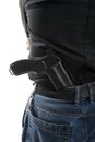 Man with a gun behind his back Royalty Free Stock Photo