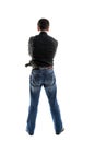 Man with a gun behind his back Royalty Free Stock Photo
