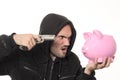 Man with gun and pink piggy bank Royalty Free Stock Photo
