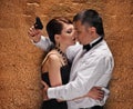 Man with gun protecting his woman Royalty Free Stock Photo