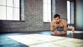 Man at the gym doing stretching