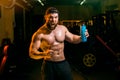 Man in the gym with shaker Royalty Free Stock Photo