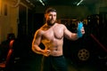 Man in the gym with shaker Royalty Free Stock Photo