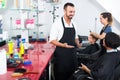 Man hairdresser talking to woman