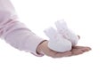 Man hand with baby shoe Royalty Free Stock Photo