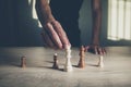 Man hand chess on the wooden table.