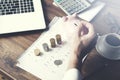 Man hand coins and piggy bank with computer