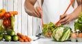 Man hand cook make mix vegetables salad on kitchen Royalty Free Stock Photo