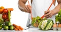 Man hand cook make mix vegetables salad on kitchen Royalty Free Stock Photo