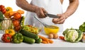 Man hand cook make omelette, beating whisk eggs, on kitchen Royalty Free Stock Photo