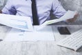 Man hand on document in office