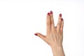 A man hand doing the Vulcan salute on a white background. Vulcan hand salute against. Spock hand. Alpha Royalty Free Stock Photo