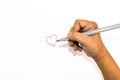 Man hand is drawing heart sign with red marker pen Royalty Free Stock Photo