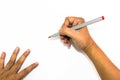 Man hand is drawing with the red marker pen Royalty Free Stock Photo