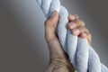 Man hand grab grip strong big aged rope Royalty Free Stock Photo