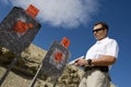 Man With Hand Gun Near Targets At Firing Range Royalty Free Stock Photo