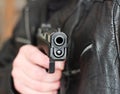 Man with hand gun pistol rubber attack violence Royalty Free Stock Photo