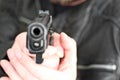 Man with hand gun pistol rubber attack violence Royalty Free Stock Photo