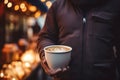 Man hand hold cup hot coffee beans cozy cafe evening relaxation calm tasty drink cocoa latte cappuccino americano Royalty Free Stock Photo
