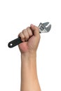 Man hand holding adjustable wrench Royalty Free Stock Photo