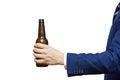 A man hand holding beer bottle on white background. A hand holding up a beer bottle without label Royalty Free Stock Photo