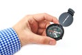 Man hand holding a black compass on white Royalty Free Stock Photo