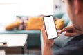 Man hand holding the black smartphone with big blank screen and modern frame less design Royalty Free Stock Photo