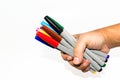 Man hand holding the colorful marker pen Royalty Free Stock Photo