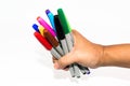 Man hand holding the colorful marker pen Royalty Free Stock Photo