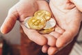 Man hand holding cryptocurrency golden and silver bitcoin coin. Electronic virtual money for web banking and international network Royalty Free Stock Photo