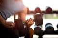 Man hand holding dumbbell exercise in gym. Fitness muscular body Royalty Free Stock Photo