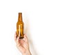 Man hand holding a empty bottle of beer Royalty Free Stock Photo