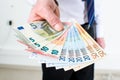 Man hand holding euro notes Royalty Free Stock Photo