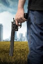 Man hand holding gun Royalty Free Stock Photo