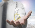 Man hand holding key with house shape key ring,3D rendering Royalty Free Stock Photo