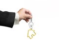 Man hand holding key with house shape keyring Royalty Free Stock Photo