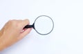 Man hand holding  Magnifying glass  isolate on a white background Royalty Free Stock Photo