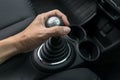 Man hand holding manual transmission Royalty Free Stock Photo