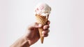 Man hand holding milk ice cream in a cone isolated on white background. Generative AI Royalty Free Stock Photo